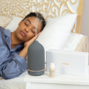 Woman sleeping with diffuser..jpg__PID:11ecfeeb-2008-49cf-be49-d636948f0fc7