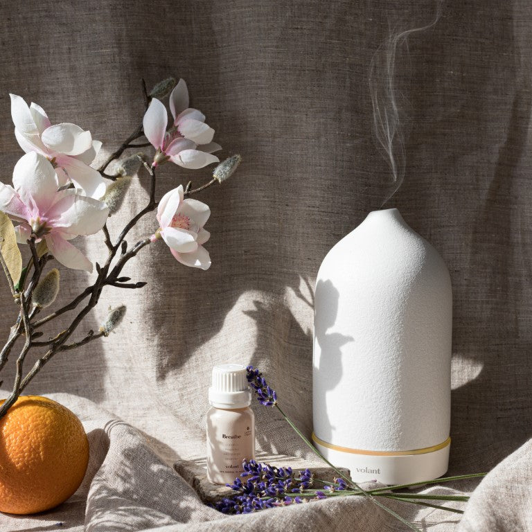 volant white diffuser using breathe essential oil blend made with pure Wild Orange, Lavender, Copaiba, and Magnolia