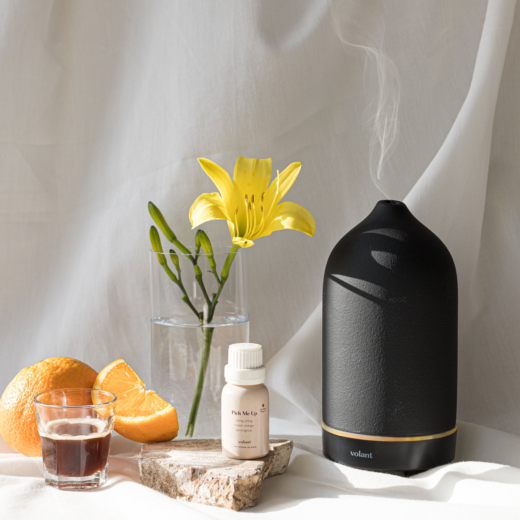 volant black diffuser using pick me up essential oil blend made with pure Sweet Orange, Lemongrass, and Ylang Ylang