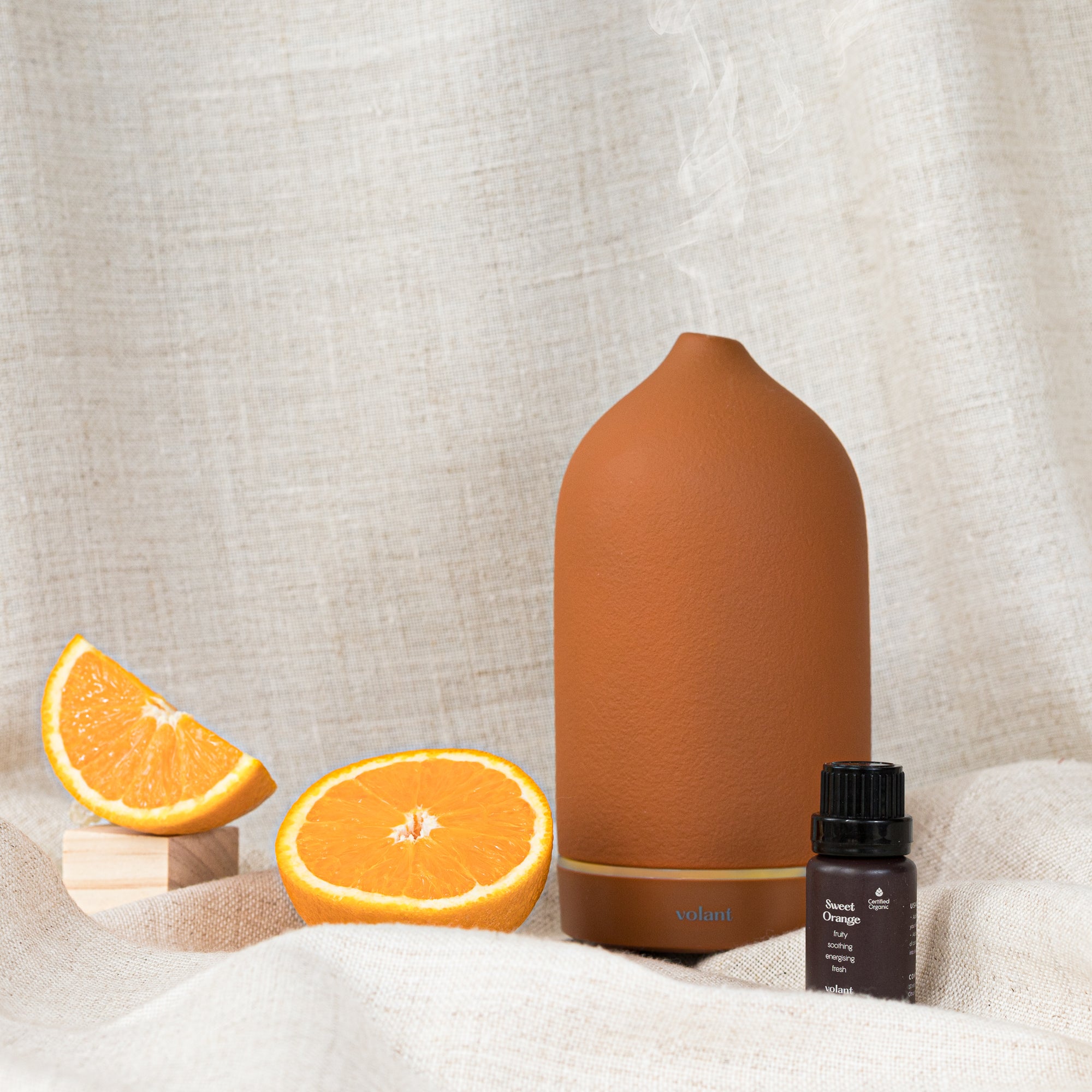 Volant Clay diffusor med ekologisk eterisk olja av söt apelsin för fräsch doft i hemmet